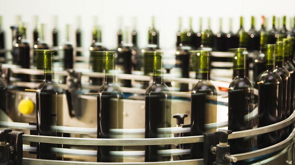 Wine bottles on a production line.